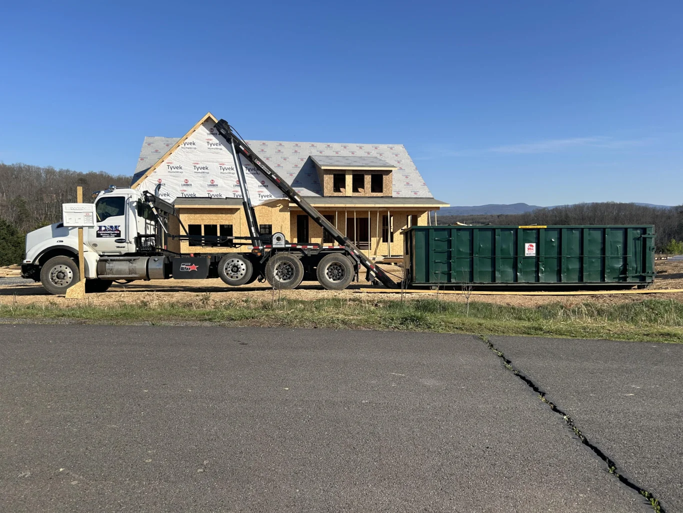 Roll off dumpster delivered to a new home construction site in Winchester VA